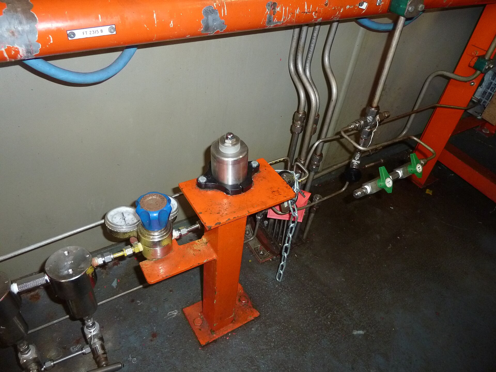 An industrial gas pressure regulator with pressure gauge
