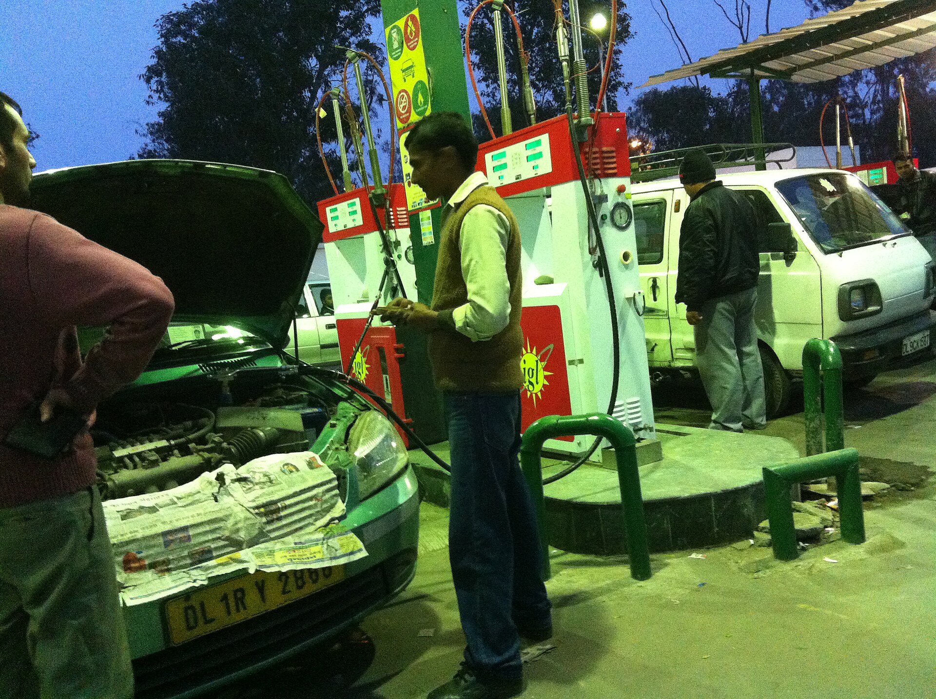 A CNG filling station in Delhi, India, with vehicles queuing to refuel